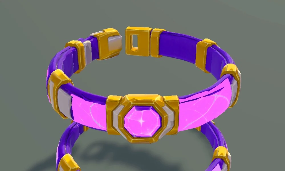 Ein violettes Halsband mit goldenen Beschlägen und leuchtend pinkem Stein