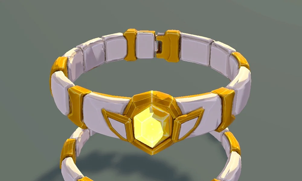 Ein weiß-goldenes Halsband mit gelbem Stein